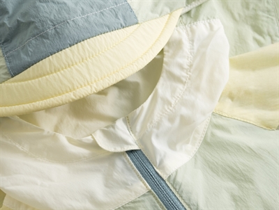 Mini A Ture Matmulti uv overgangsjakke i wheat yellow col. b. med farveblokke