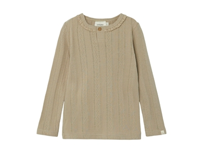 Lil Atelier top tuffet flæse