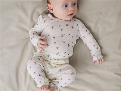 Name It leggings i snow white merinould med blomsterprint på baby