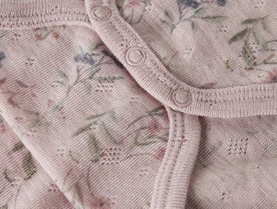 Name It lilla bodystocking i merinould til baby med blomster