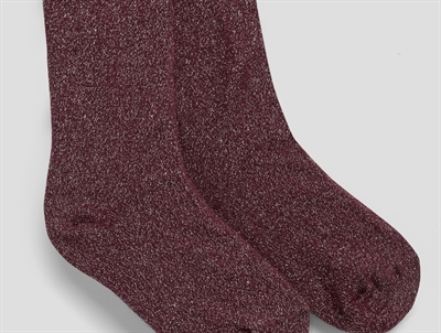 Detalje af burgundy strømpebukser med glimmereffekt fra Name It