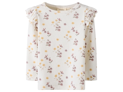 Lil Atelier bluse coconut milk med blomster og flæser