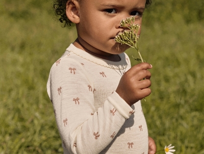 Lil' Atelier body i turtledove melange uld modal til baby