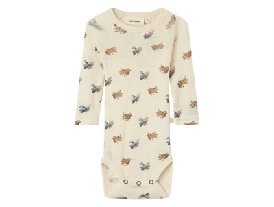 Lil' Atelier body turtledove melange i uld modal med flyprint