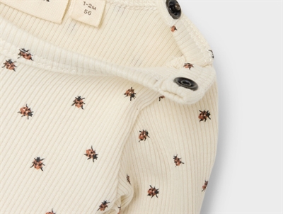 Lil Atelier body turtledove med mariehøner