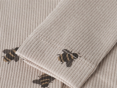 Name It leggings i råhvid nuance detalje med rib og bi print