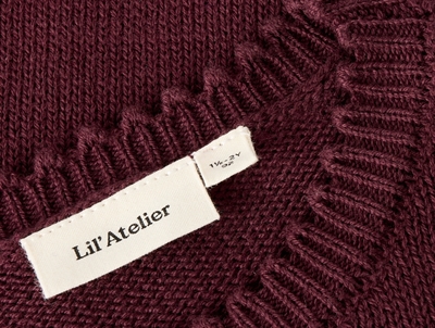 Lil\' Atelier strikbluse med bølgekant detaljer