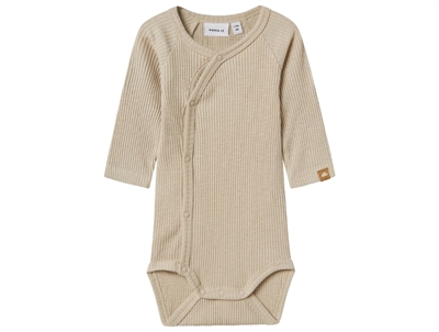 Name It body peyote med wraplukning i rib