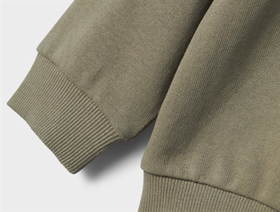 Lil\' Atelier sweatshirt i grøn nuance med dinosaurmotiv