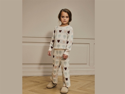 Lil\' Atelier MINI bukser i creme nuance med mønster af hjerter og luftballoner