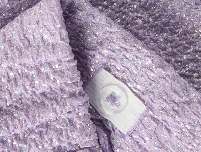 Name It glimmerbukser i lavendula set tæt på detalje