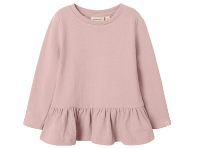 Lil' Atelier bluse i rosa nuance med peplumkant