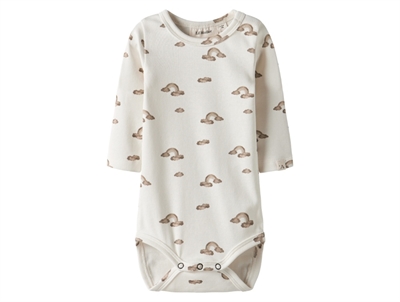 Lil Atelier body coconut milk med ribstruktur og trykknapper