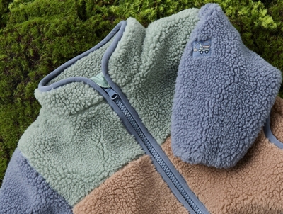 Name It teddy jakke i grøn nuance chinois green detalje af lynlaas