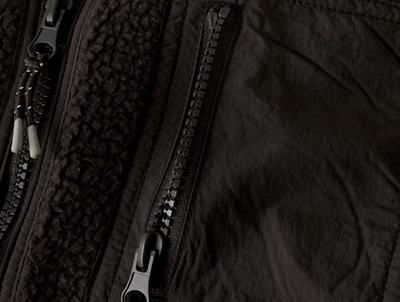 Name It teddyjakke i mørkebrun nuance med lynlåslomme detalje  