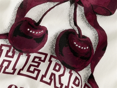 Detalje af kirsebærprint på Name It t-shirt jet stream