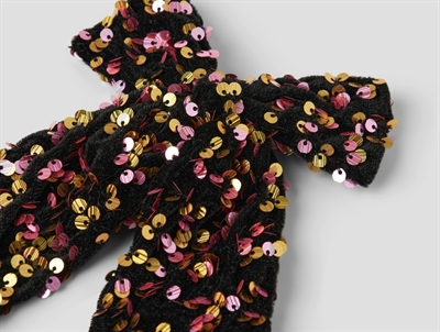 Detaljebillede af hårsløjfe fra Name It i sort med guld og pink pailletter