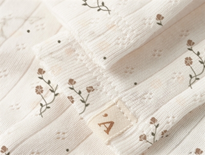 Lil\' Atelier leggings i råhvid nuance med fint blomsterprint