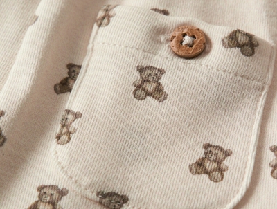 Lil\' Atelier BABY bukser i råhvid nuance med teddybjørnprint  