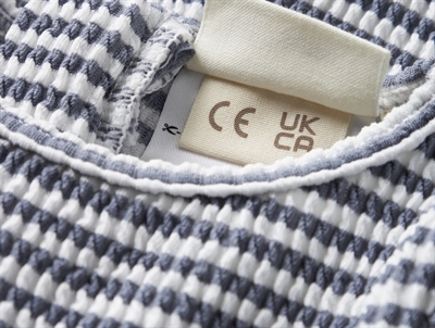 Lil\' Atelier UV dragt i blå nuance med struktur