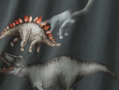 Name It bluse i mørk grøn nuance urban chic med dinosaurprint foran