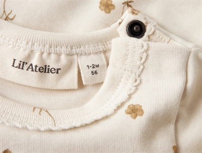 Lil\' Atelier body coconut milk med trykknap ved skulder