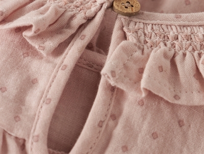 Lil\' Atelier body peach whip med smockdetalje