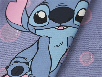Detalje af Name It leggings med Stitch motiv