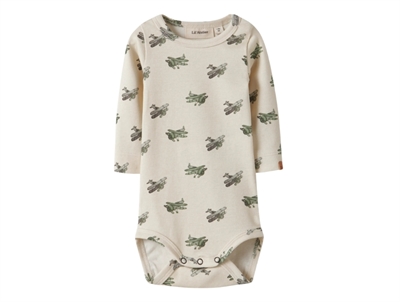 Lil' Atelier body i råhvid nuance med fly print
