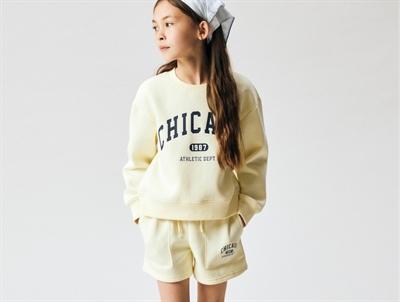 Name It sweatshirt i gul nuance med chicago print