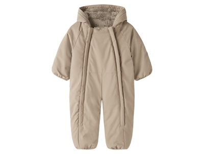 Name It køredragt i beige nuance med teddyfor