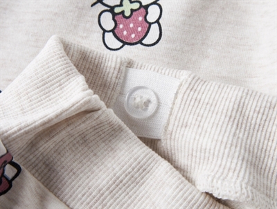 Name It sweatpants i beige nuance med Hello Kitty print detalje
