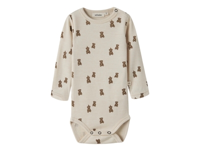 Lil' Atelier merinould body i råhvid nuance med bamseprint