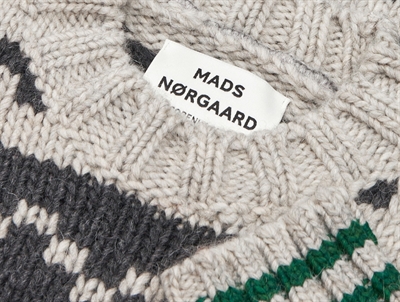 Crash sweater i nature melange med gråt mønster tæt på hals