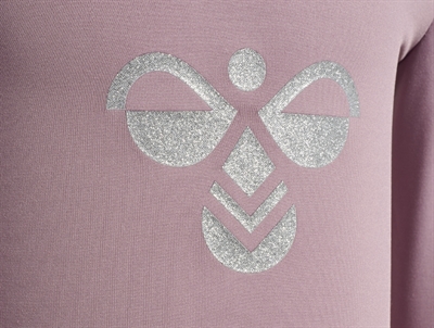 Hummel gymdragt med glitterlogo i rosa nuance
