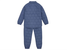 en fant termosæt i vintage indigo med quiltet struktur og elastik, set bagfra