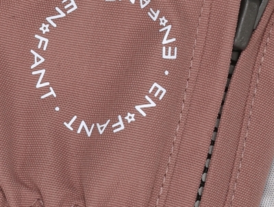 En Fant luffer i rosa nuance med lynlås detalje