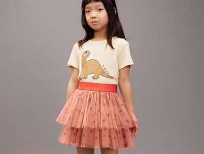 Barn med pink tylskørt med prikker fra Mini Rodini