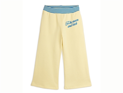 Mini Rodini sweatpants i yellow med to the moon broderi set forfra