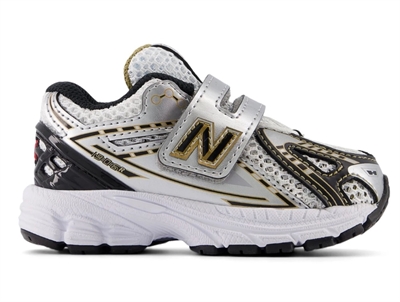 New Balance 1906 børnesneaker i sølv med velcrolukning