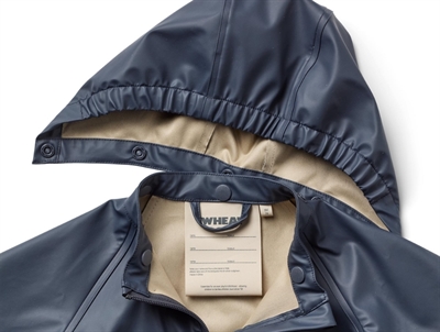 Wheat Mika regndragt ink detalje