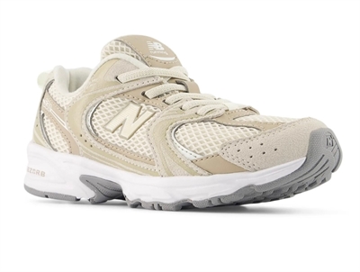 New Balance 530 sneaker til børn i beige nuance med elastiksnørebånd