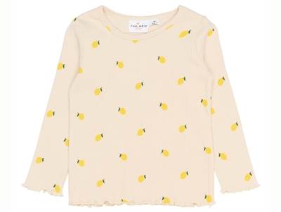 THE NEW Siblings Smilla rib bluse gardenia aop med citronprint forfra